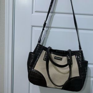 16 in. long, 9 1/2 in. deep, shoulder is 42 in. And adjustable